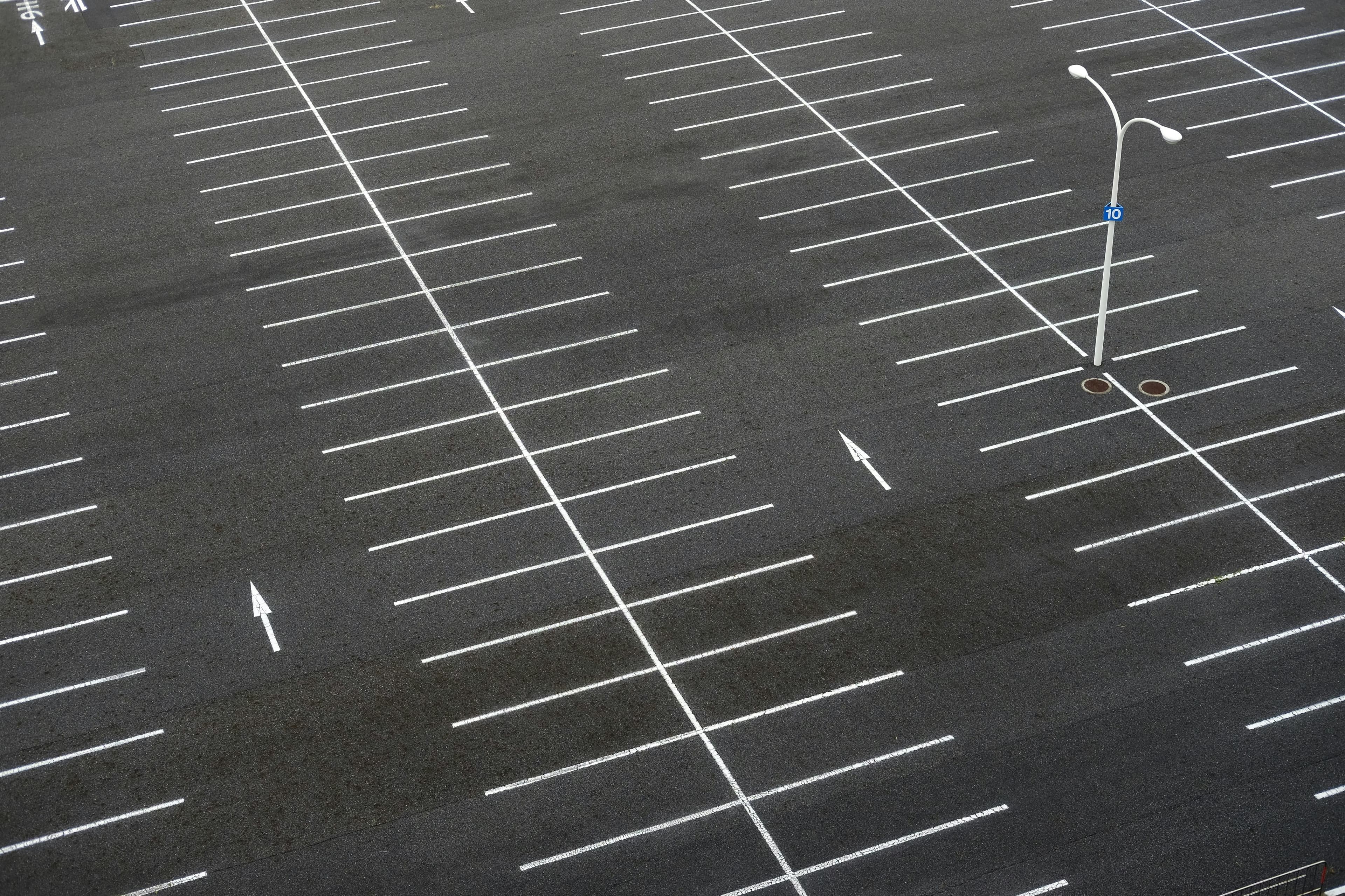 Freshly marked parking lot with crisp stall lines